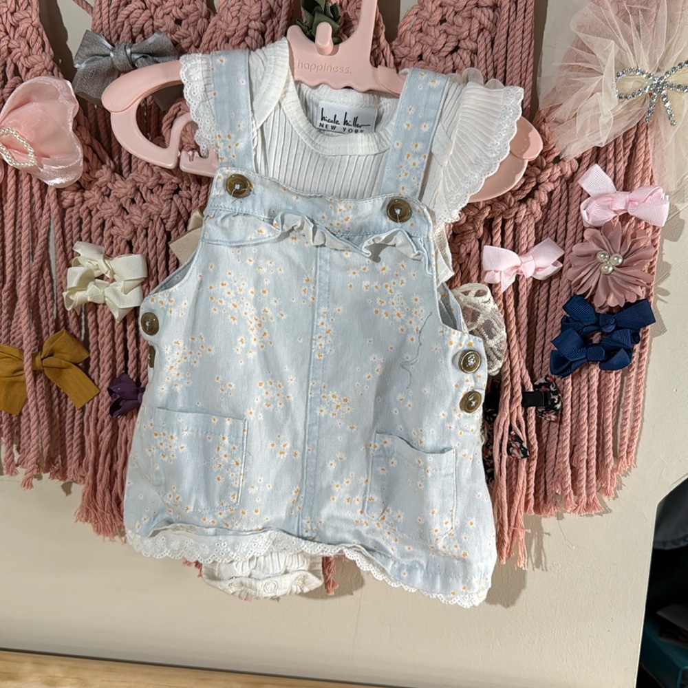 3-6 months 2pc dress with onesie 
And bow